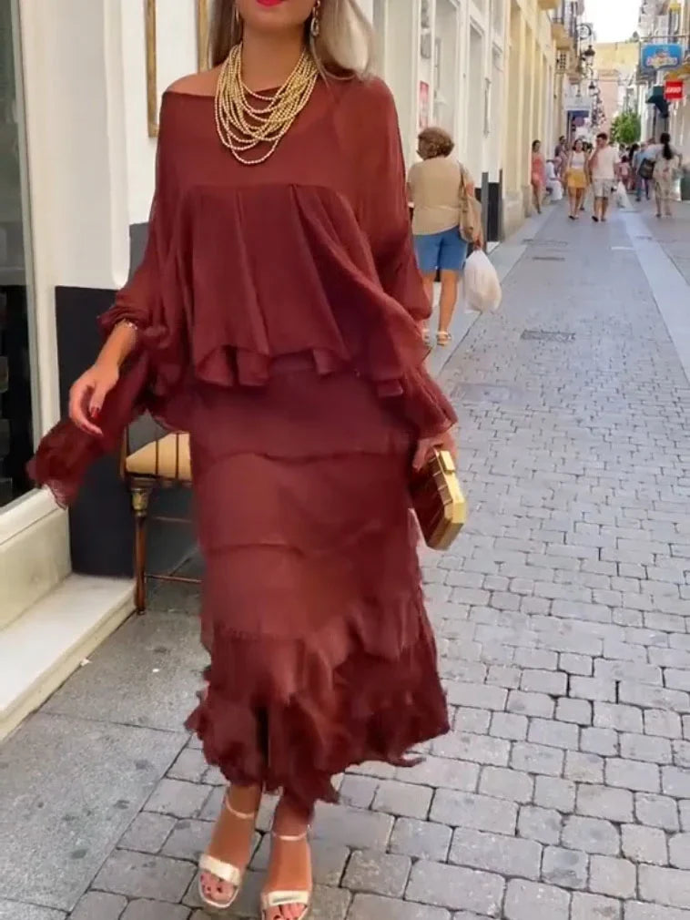 Vestido assimétrico com camadas e folhos