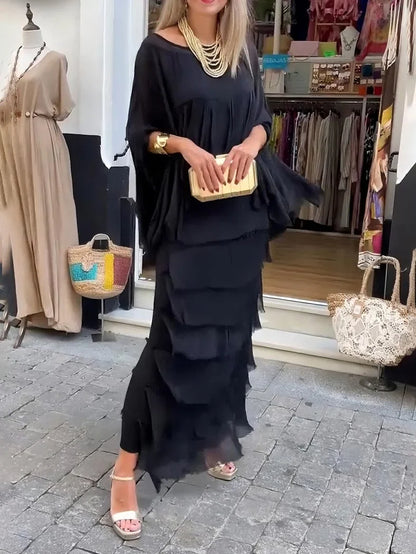 Vestido assimétrico com camadas e folhos