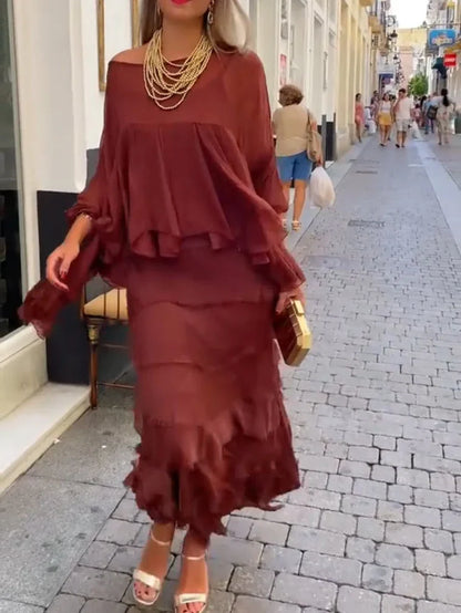 Vestido assimétrico com camadas e folhos